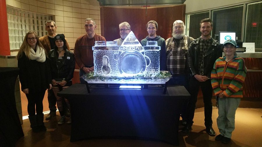 Big Print Show contestants pose with Culinary Arts professor Patrick Stewarts ice sculpture.