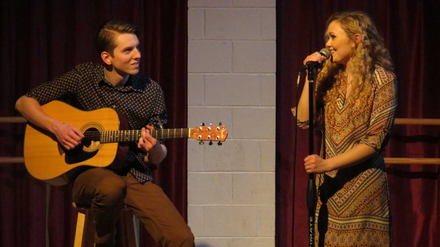 Gray Davis and Kaylee Hofman sing “Sea of Love” for the audience of Elgin Community College’s Spartan Mic Night. 