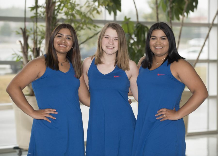 Pictured here are the three ladies that make up the Tennis team. Alejandra Abella, Marie Beyer, and Carolina Abella.