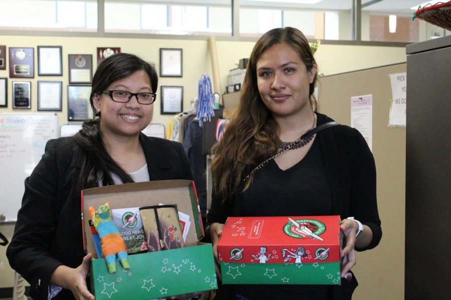 USAC President, Eloisa Basilio and Educational Officer, Estefania Sanchez with finished boxes for Operation Christmas Child