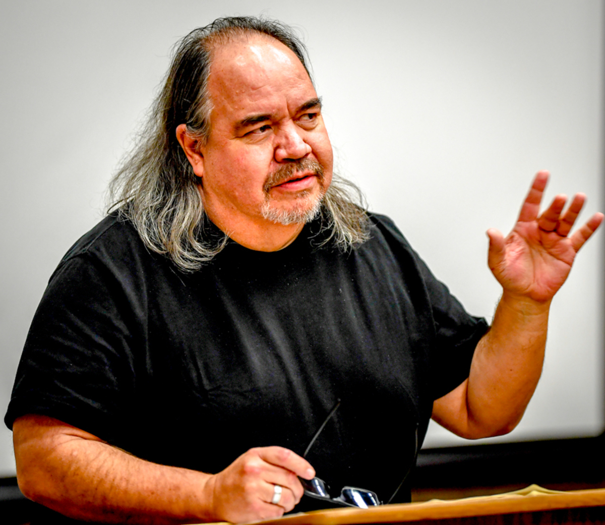 Mark Turcotte reads his poetry in a very compelling musical and rhythmic manner. The audience was captivated by his poetry which reflected his native American up bringing.