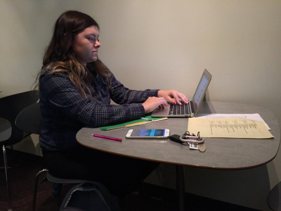 ECC student , Julie Henlich, is one of the many students who use mobile devices such as a laptop which is connected to the campus WiFi for school work. Photo by: Juan Castillo