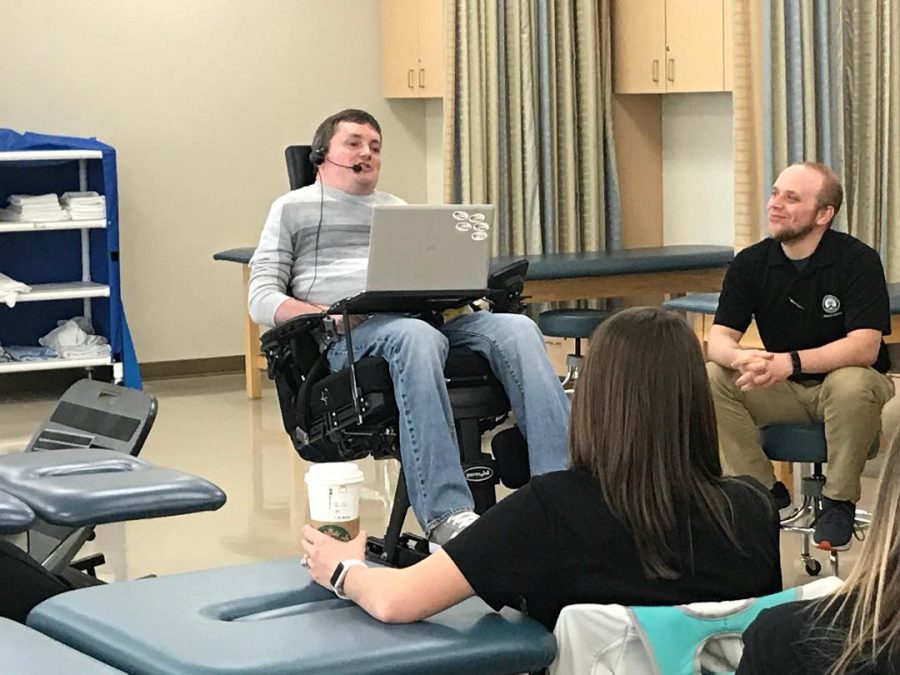 Assistant Professor of English John Mravik visited a group of students from the PTA (physical therapist assistant) program on March 23. Mravik, a quadriplegic and former ECC Orrin G. Thompson Teaching Excellence Award winner, spoke to them about handling wheel-chair bound patients. 