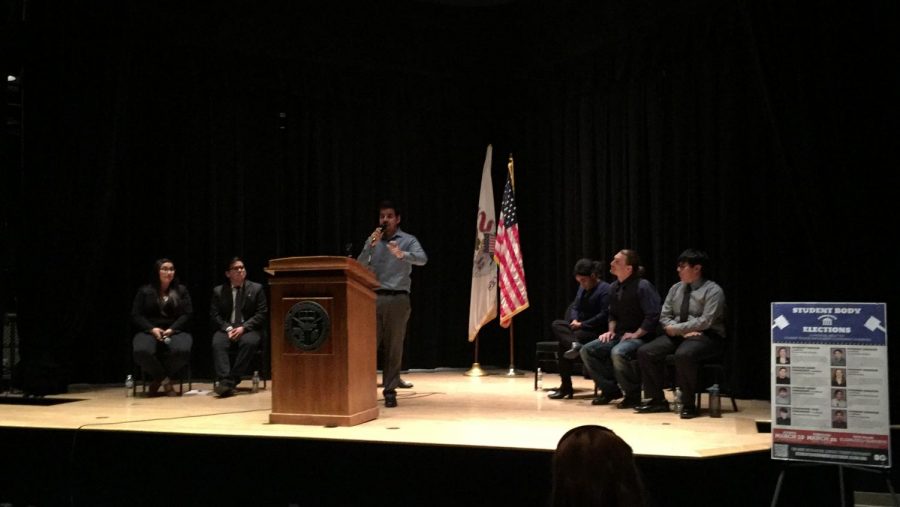 Student Senator candidate Andres Garcia speaking to the crowd during the student government town hall meeting. 