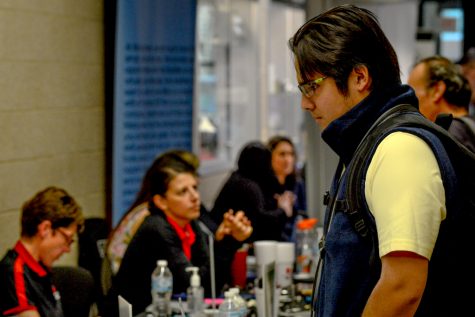 Students engage in discussions at the ECC Manufacturing & Technology Job fair in Building O on Tuesday, October 8.