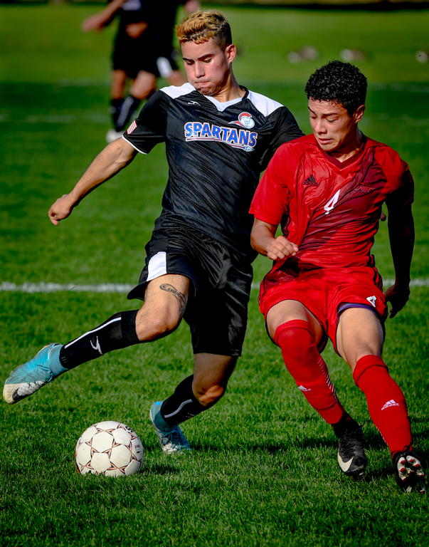 Oscar Chavez attempts to get past Waubonsee Community Colleges defense on Oct. 11 