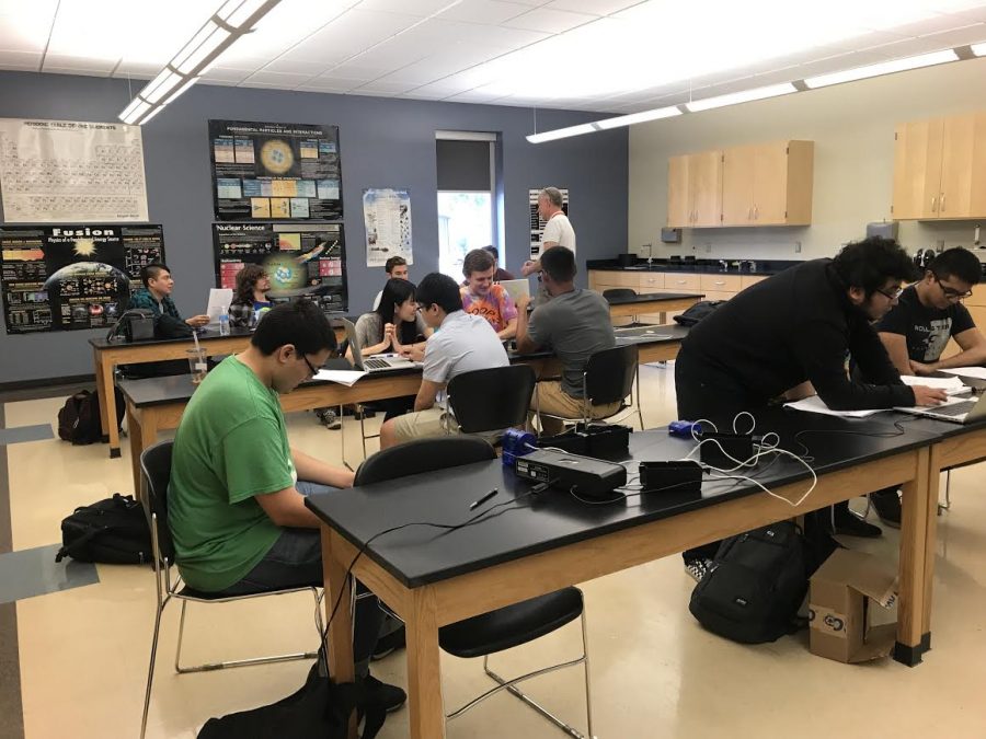 Students at ECC taking a class under the instruction of Associate Professor of Physics Ted Eltzroth