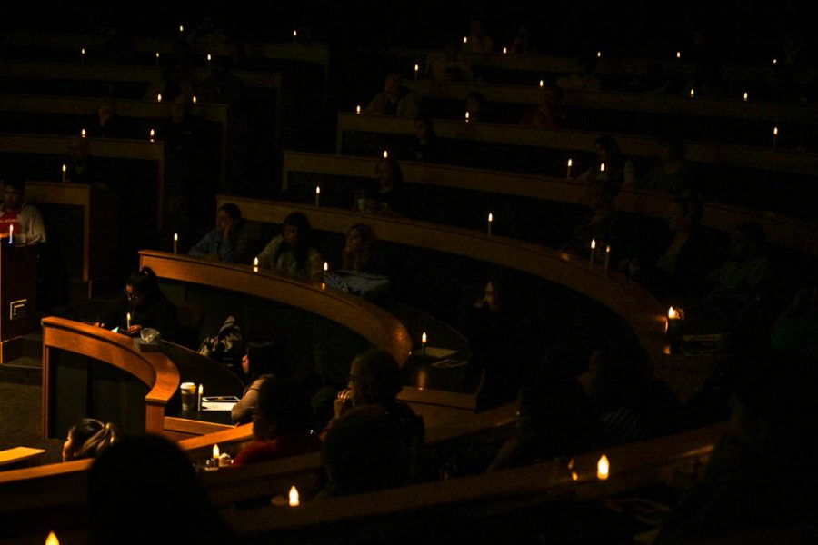 The candlelight vigil in the Seigle Auditorium held Thursday evening Oct. 24. During the vigil, the stories of local domestic abuse victims were read aloud.