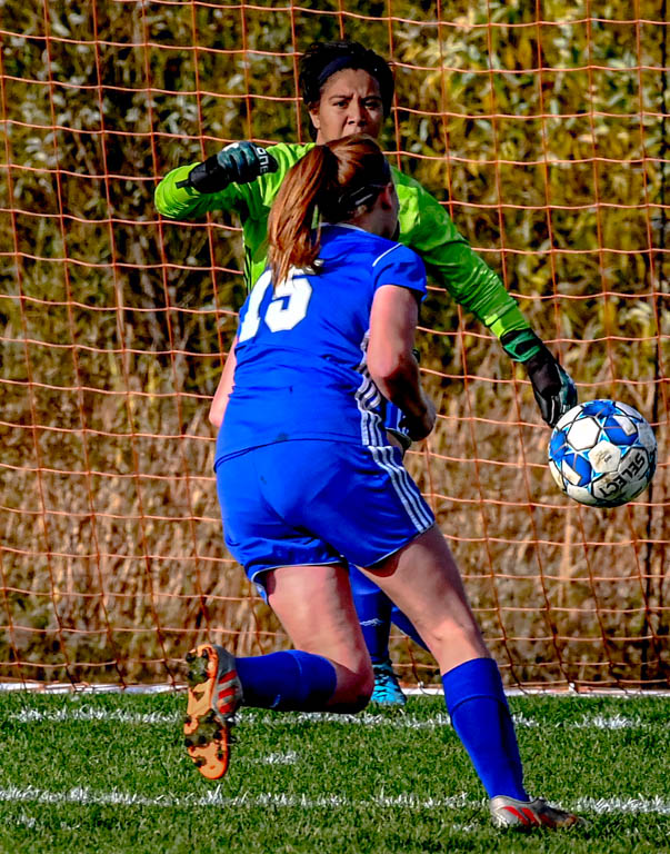 Lady Spartan soccer team heads to division semifinals with 3-0 win over Harper College.