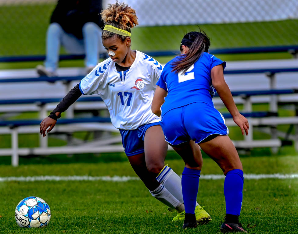 Lady Spartan soccer team heads to division semifinals with 3-0 win over Harper College.