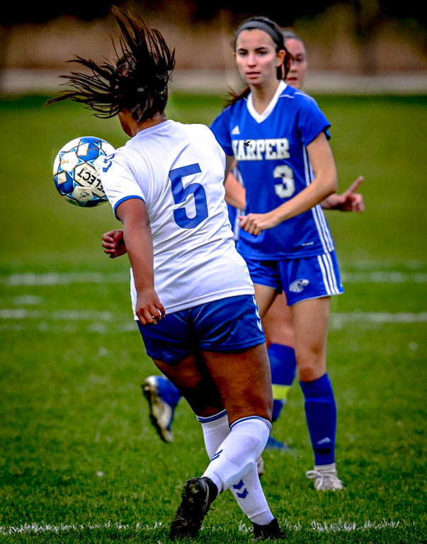 Lady Spartan soccer team heads to division semifinals with 3-0 win over Harper College.