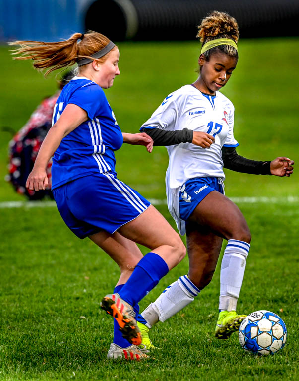 Lady Spartan soccer team heads to division semifinals with 3-0 win over Harper College.