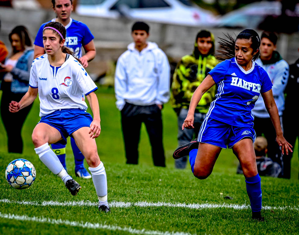 Lady Spartan soccer team heads to division semifinals with 3-0 win over Harper College.