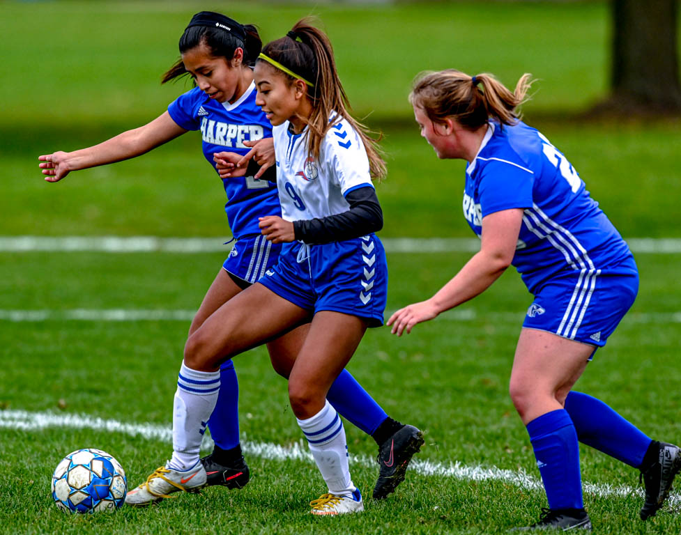 Lady Spartan soccer team heads to division semifinals with 3-0 win over Harper College.