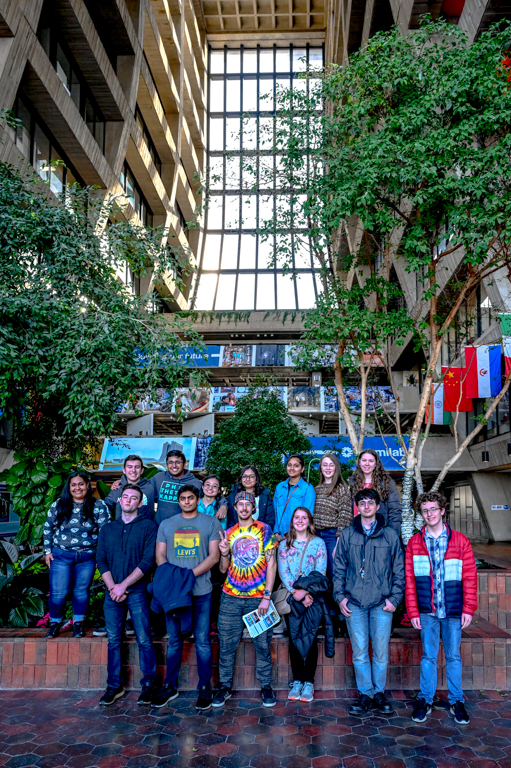 Phi Theta Kappa  group photo in lobby of fifteen story Wilson Hall at Fermi  National  Accelerator Laboratory.
