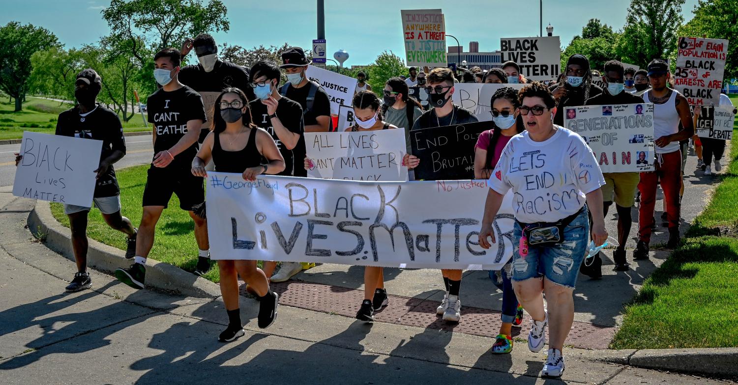 Protesters march from ECC to Elgin Police Department