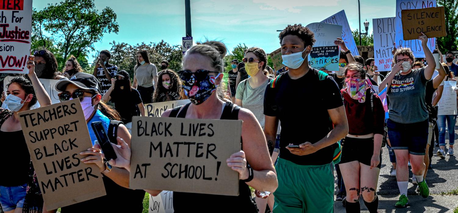 Protesters march from ECC to Elgin Police Department