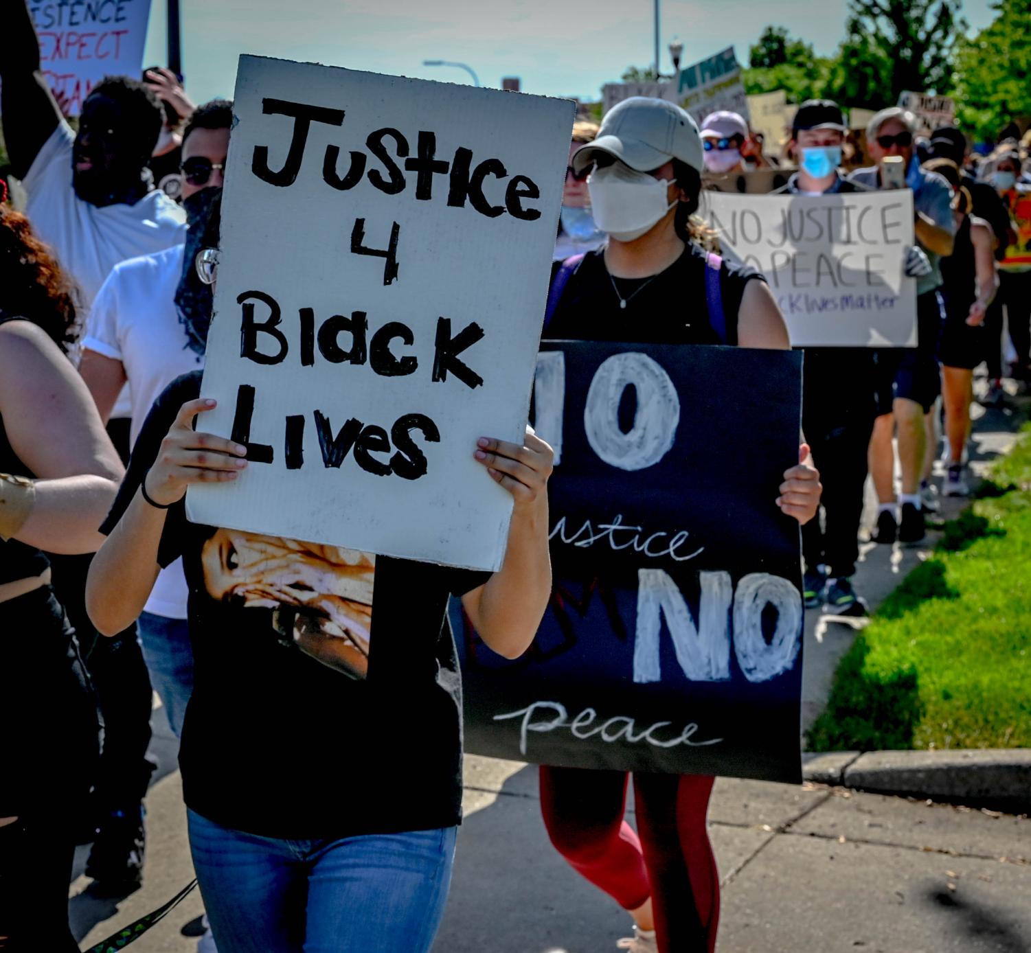 Protesters march from ECC to Elgin Police Department