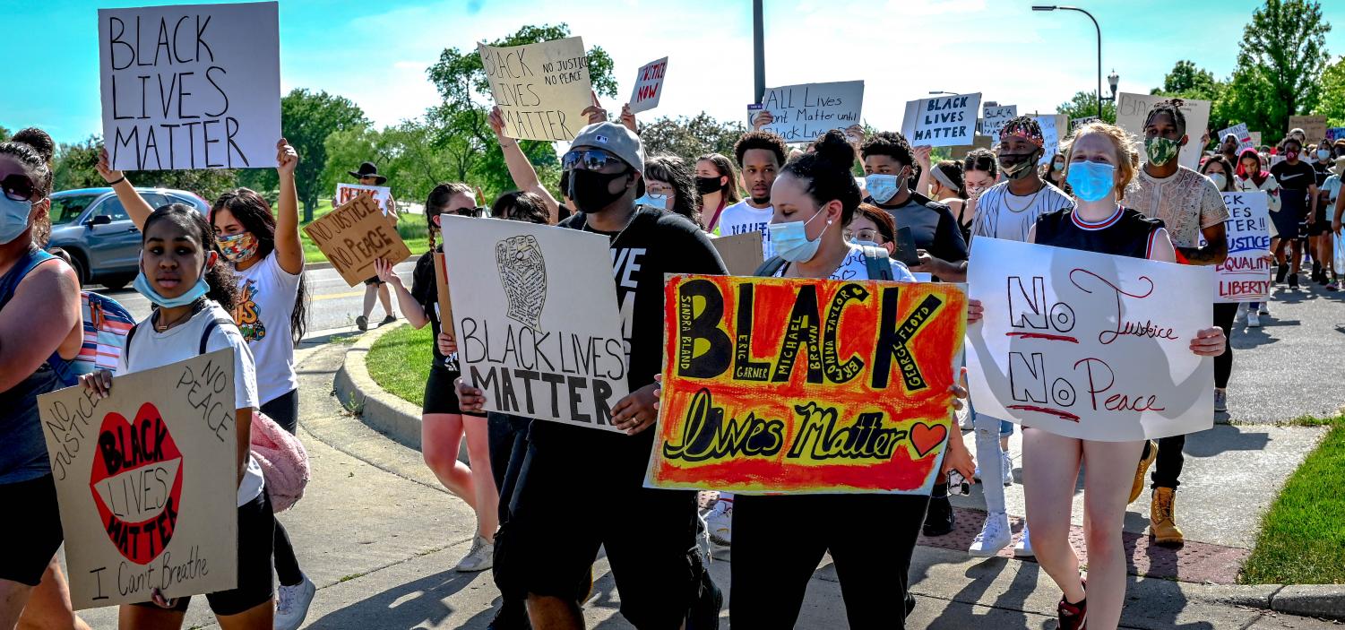 Protesters march from ECC to Elgin Police Department