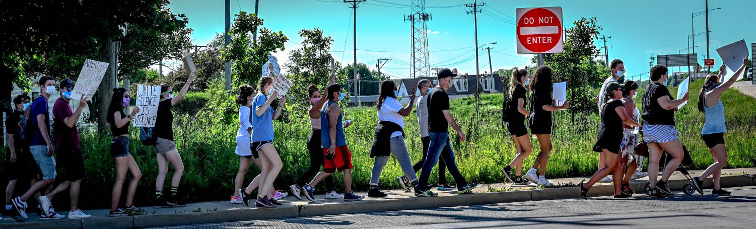 Protesters march from ECC to Elgin Police Department