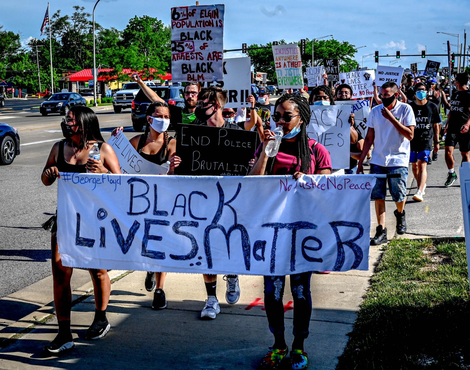 Protesters march from ECC to Elgin Police Department