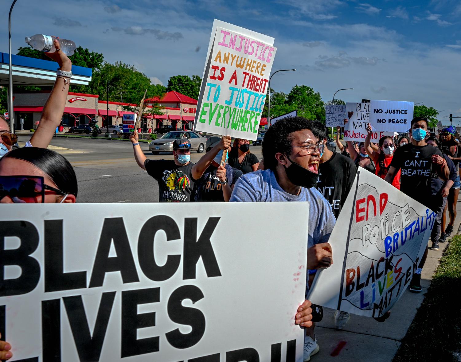 Protesters march from ECC to Elgin Police Department