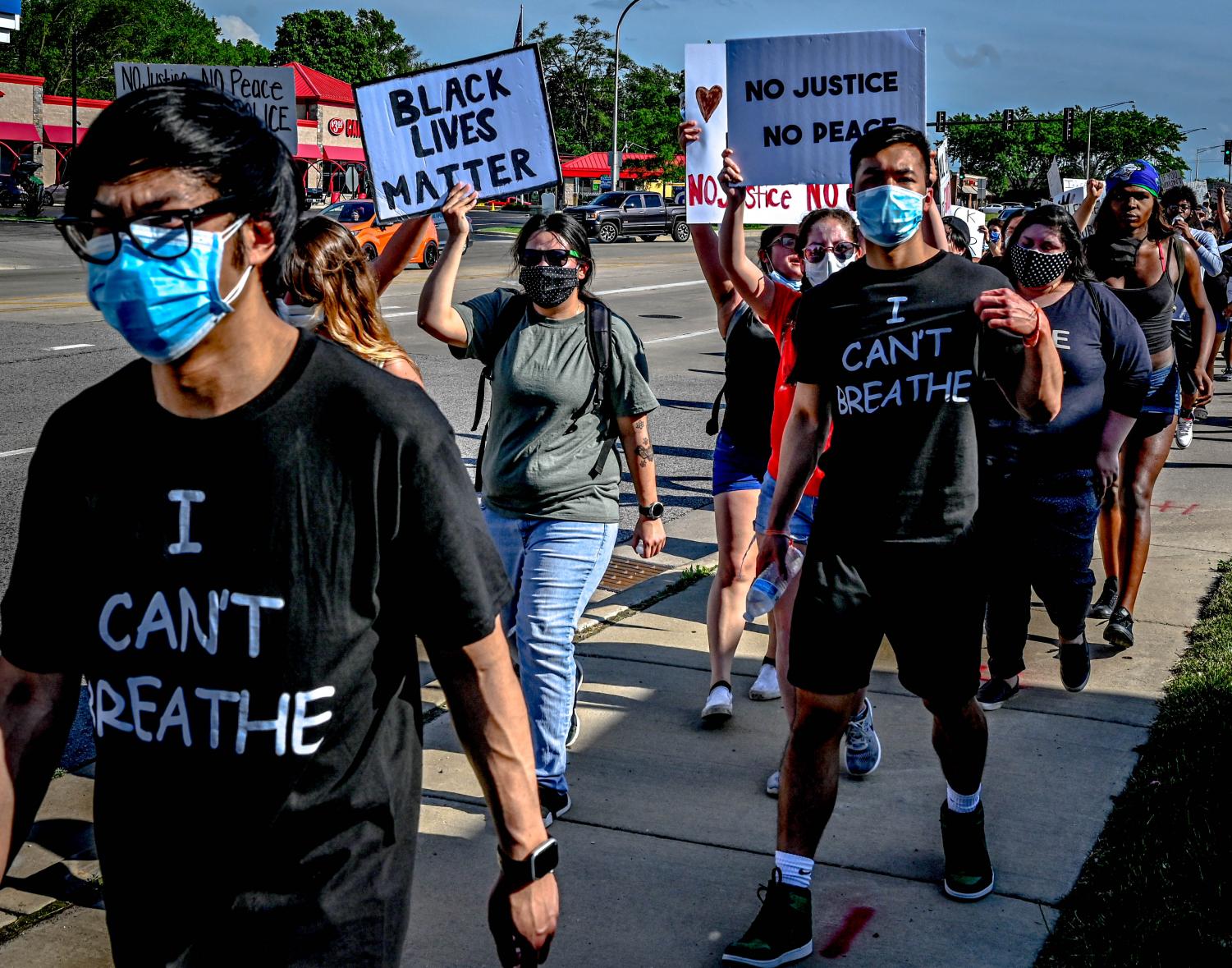 Protesters march from ECC to Elgin Police Department