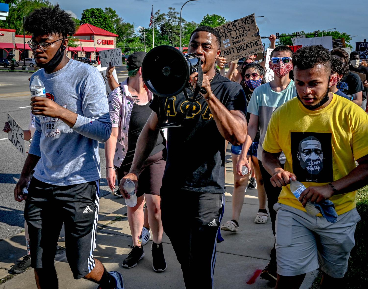 Protesters march from ECC to Elgin Police Department