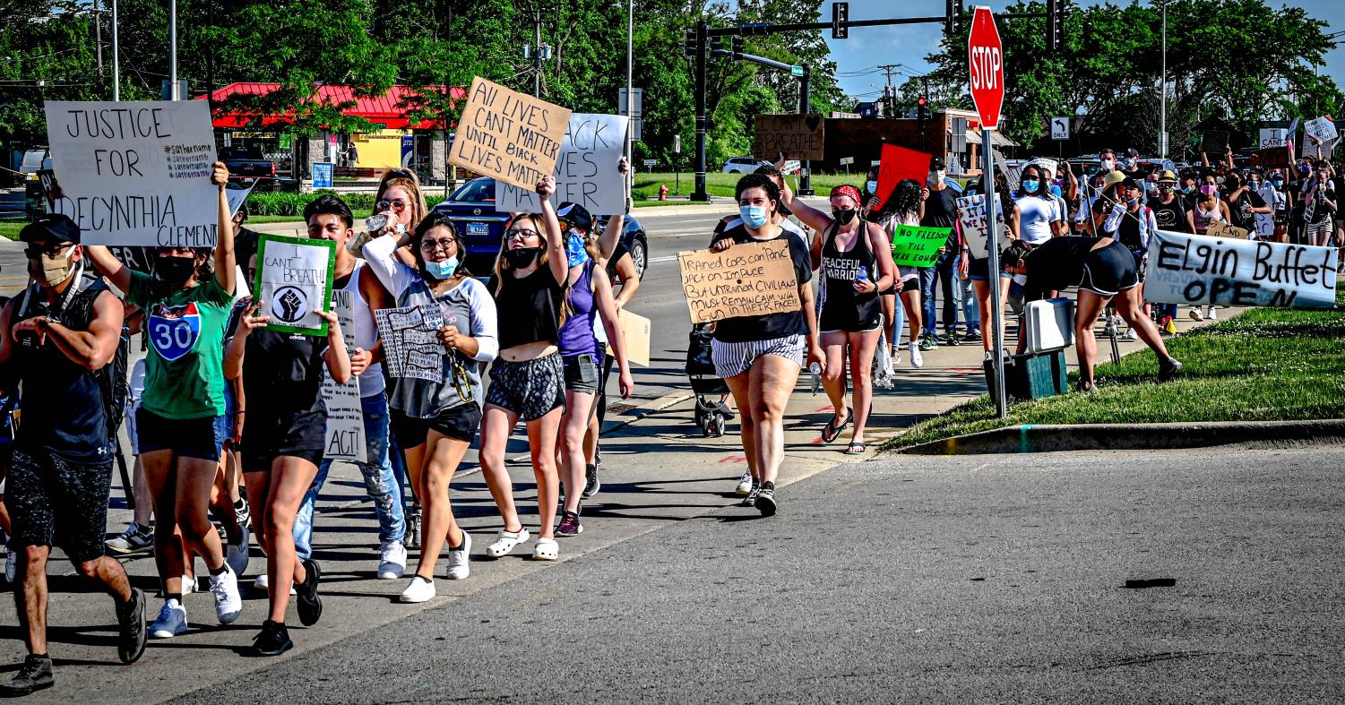 Protesters march from ECC to Elgin Police Department