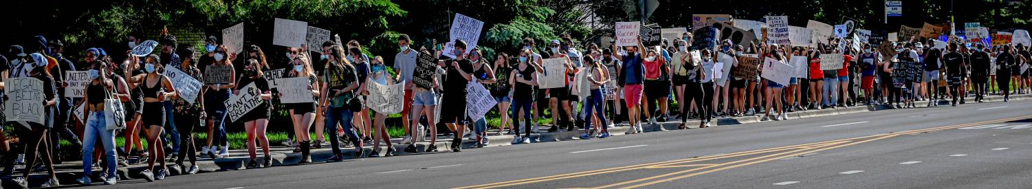 Protesters march from ECC to Elgin Police Department