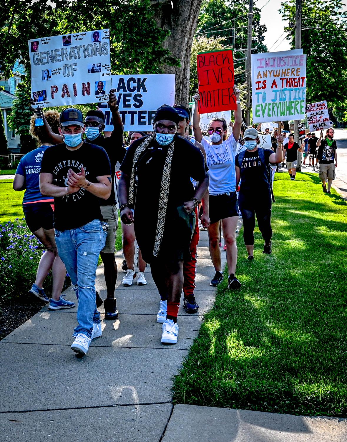 Protesters march from ECC to Elgin Police Department