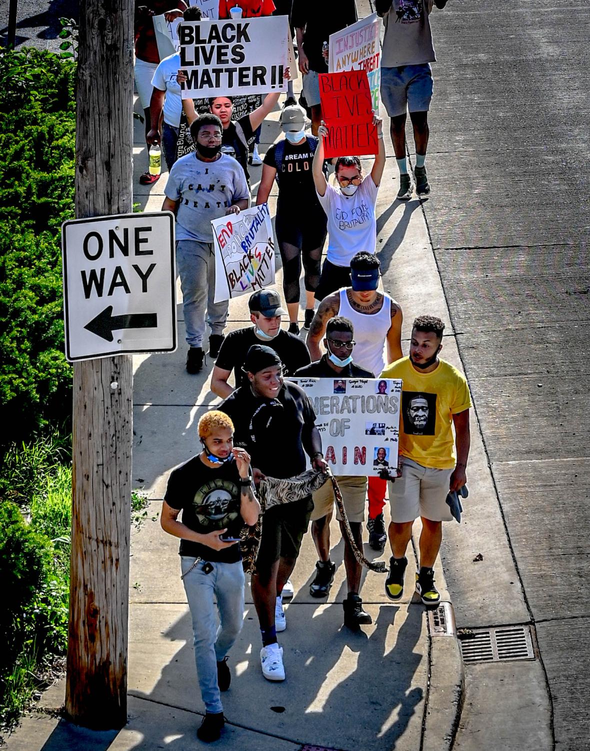 Protesters march from ECC to Elgin Police Department