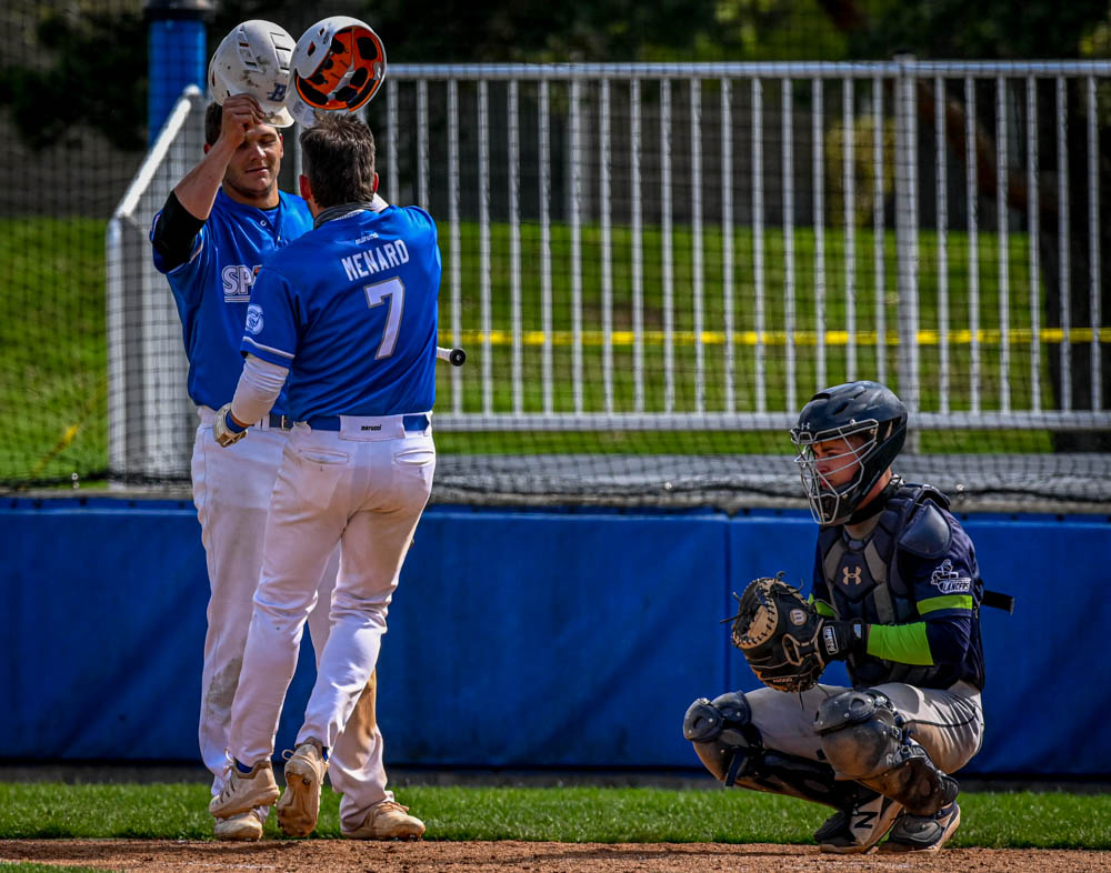 Spartans split double header against CLC