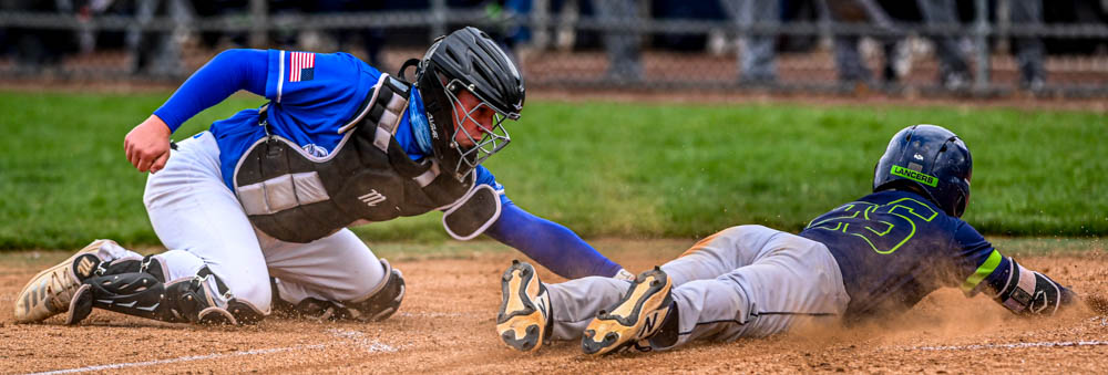 Spartans split double header against CLC