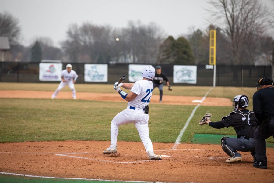 Outfielder Nick Schumann hits the ball against Oakton College on Apr. 5. 