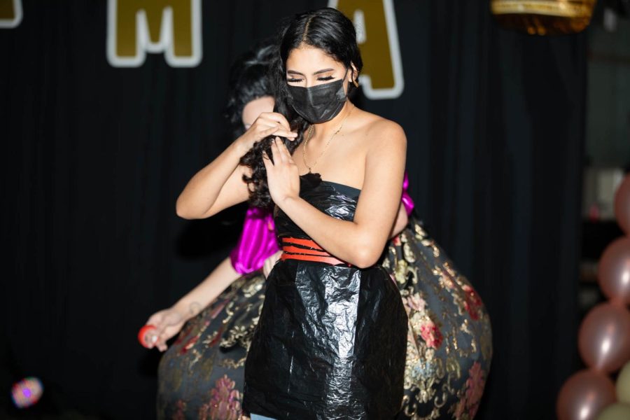 An audience participant is dressed in a plastic garbage bag at the SWANS Drag Show on April 29. 