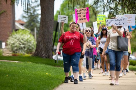 Pro-choice abortion activists gather at the Bans Off Our Body Womens March at the Kane County Courthouse in Geneva Ill. on May. 14.  
