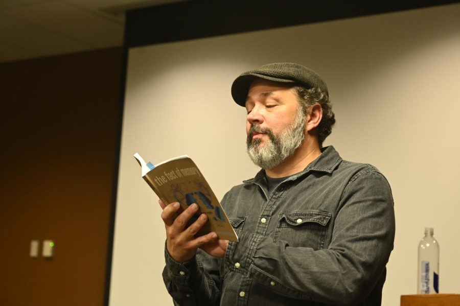 Poet Aaron Angello reads poetry during the Readers Series event in B182 on Thursday Sept. 22. 2022. Thursday was the first of three Reader Series events to place this year. 