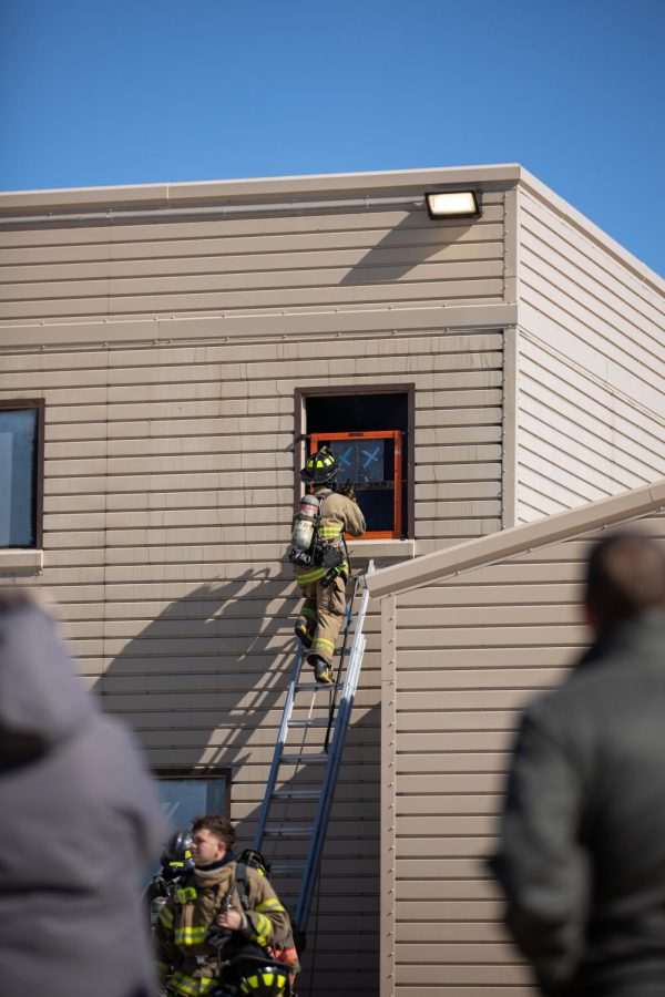 ECC fire science and safety students perform rescue drills at the ECC Center for Emergency Services Open-House Event in Burlington on Saturday, Oct. 15, 2022. 
