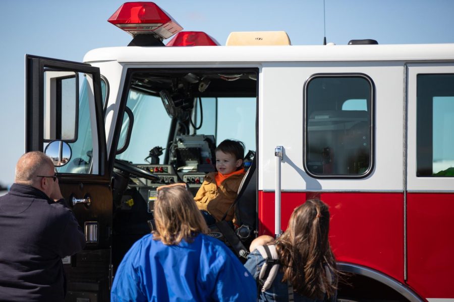 Carter Germany, 2, of Plainfield sits in the drivers seat of a firetruck at the ECC Center for Emergency Services Open-House Event in Burlington on Saturday, Oct. 15, 2022. 