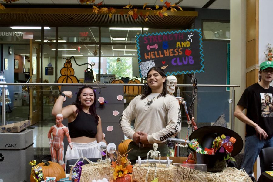 ECC second-year students Hannah Garcia, left, and Rafael Manjarrez represent the Strength and Wellness Club at Fall Fest on Oct. 5, 2022. 