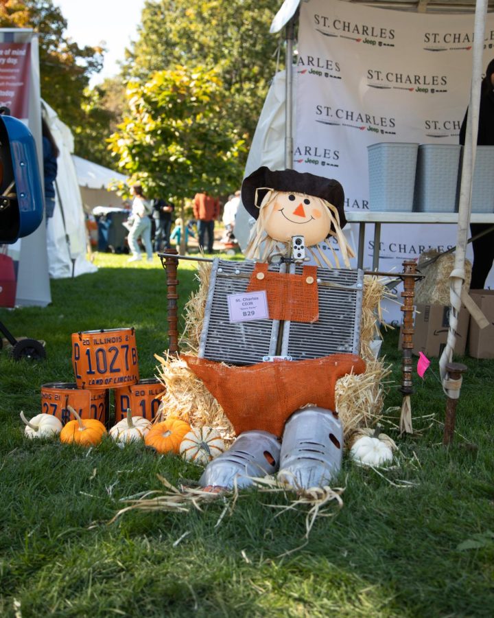 St. Charles Chrysler Dodge Jeep Rams scarecrow sits at their booth in St. Charles Lincoln Park during Scarecrow Weekend on Oct. 8, 2022. 