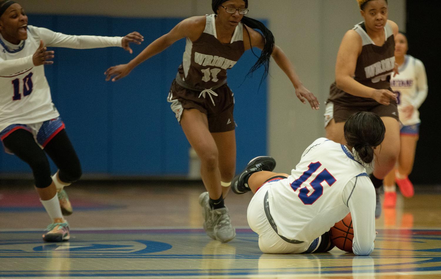 Photos: Lady Spartans win 62-61 against Wilbur Wright College