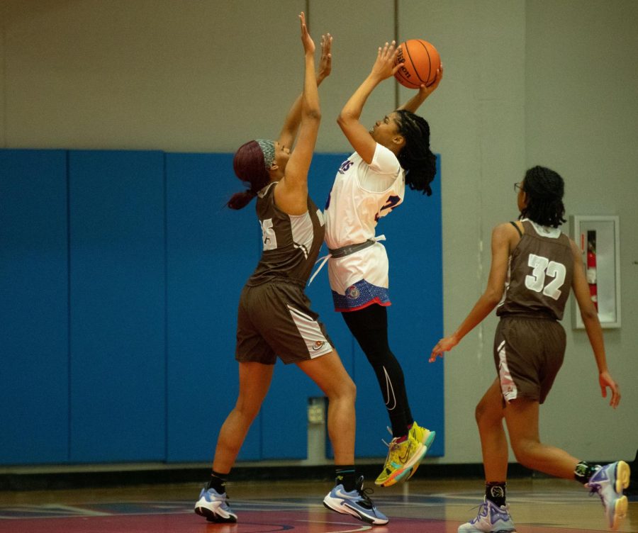 Tatianna Brown (33) goes shoots a two-pointer during a game against Wilbur Wright College on Saturday Nov. 12, 2022.  