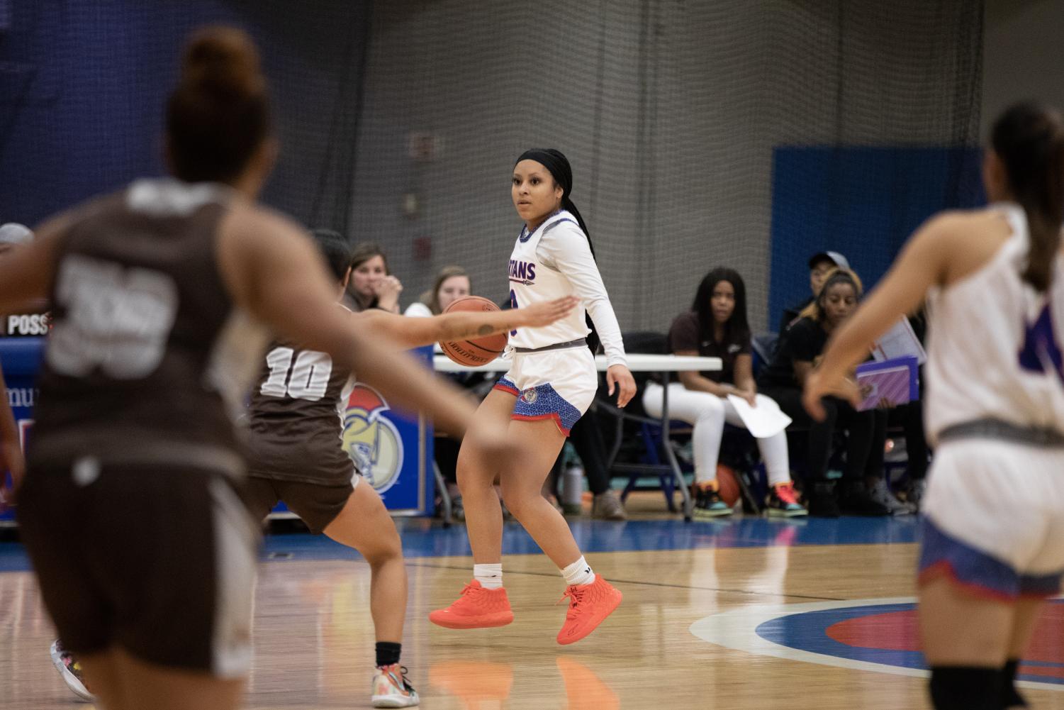 Photos: Lady Spartans win 62-61 against Wilbur Wright College