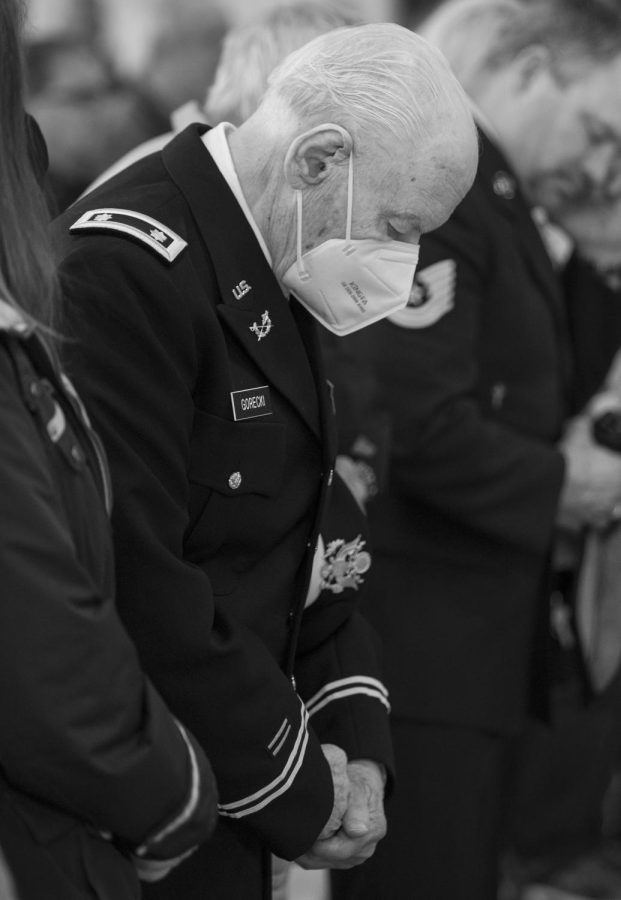 Korean War veteran Robert Gorecki  bows his head in prayer during the annual St. Charles Veterans Day Ceremony at Fire Station 1 in St. Charles on Nov. 11, 2022.  