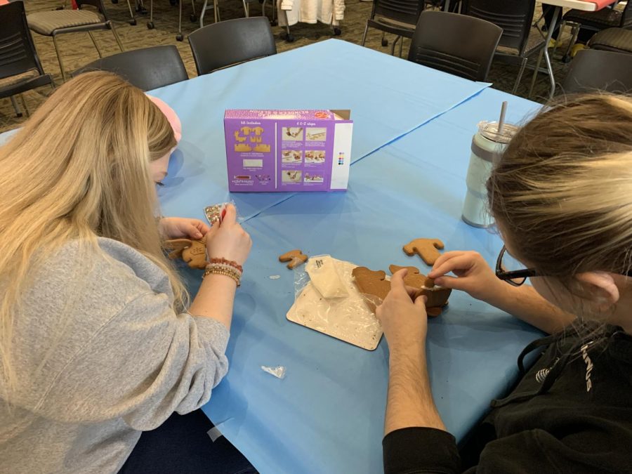 Im grateful that we get these events every once and a while, said first-year student Brianne Forrest. She worked alongside first-year student Tatiana Scheeler on their gingerbread reindeer and sleigh.