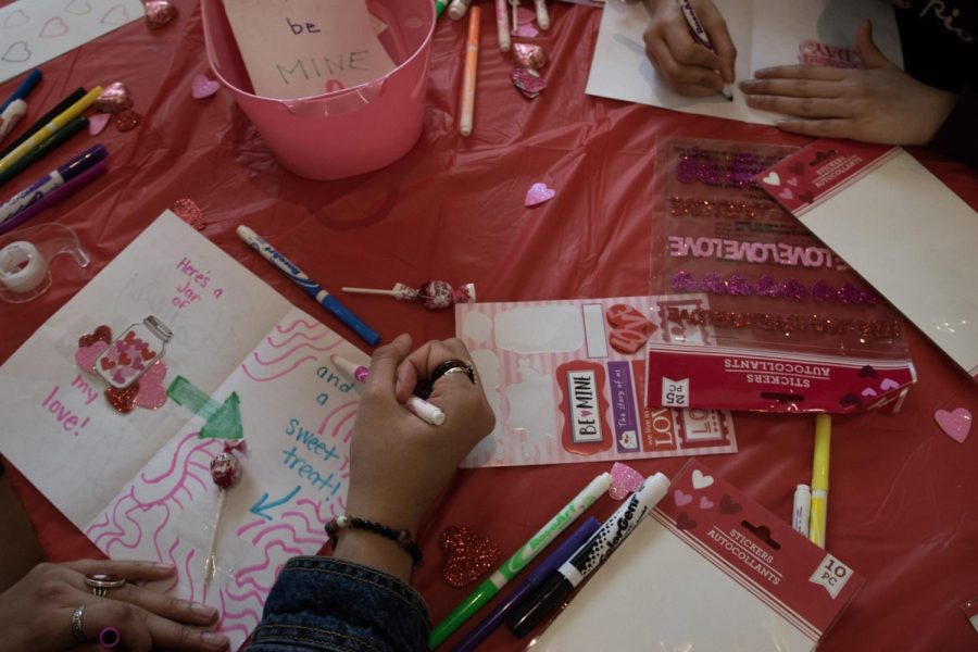 Students create interactive Valentines Day cards for seniors in the Jobe Lounge on Feb. 7, 2023. 
