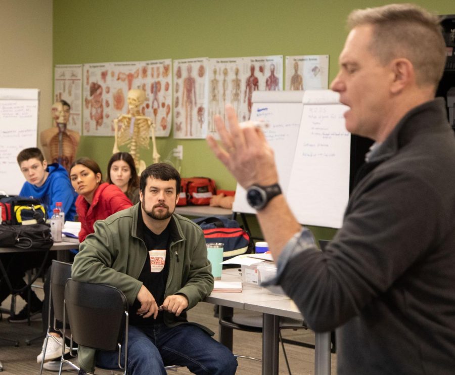 Instructor Dave Strossner shows students different medicines that an EMT would have in their ambulance during his lesson on pharmacology at the Elgin Community College Center for Emergency Services in Hampshire  on Thursday, Feb. 9, 2023. 