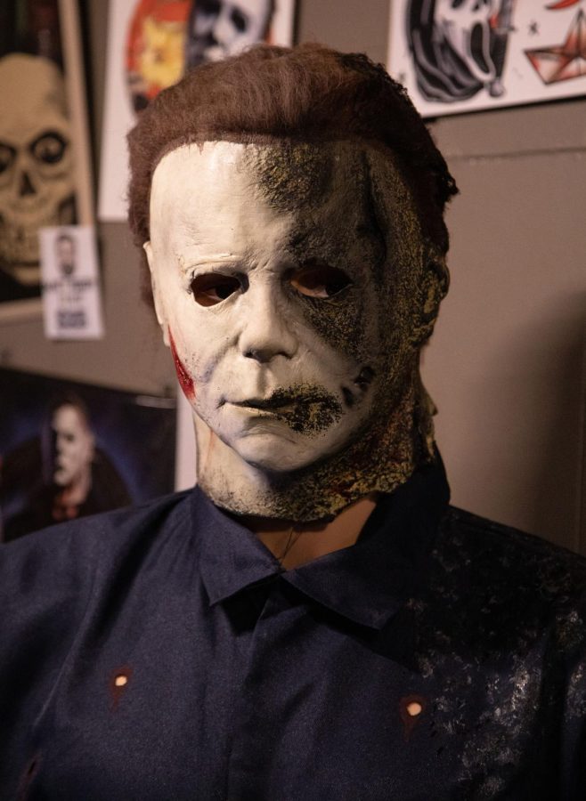 A model of Michael Myers from the  Halloween movie stands in the Pop Culture section at Ghoulish Mortals in St. Charles. 